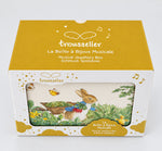 Emballage Trousselier de la boîte à bijoux musicale Peter Rabbit, vu de dessus avec couvercle jaune